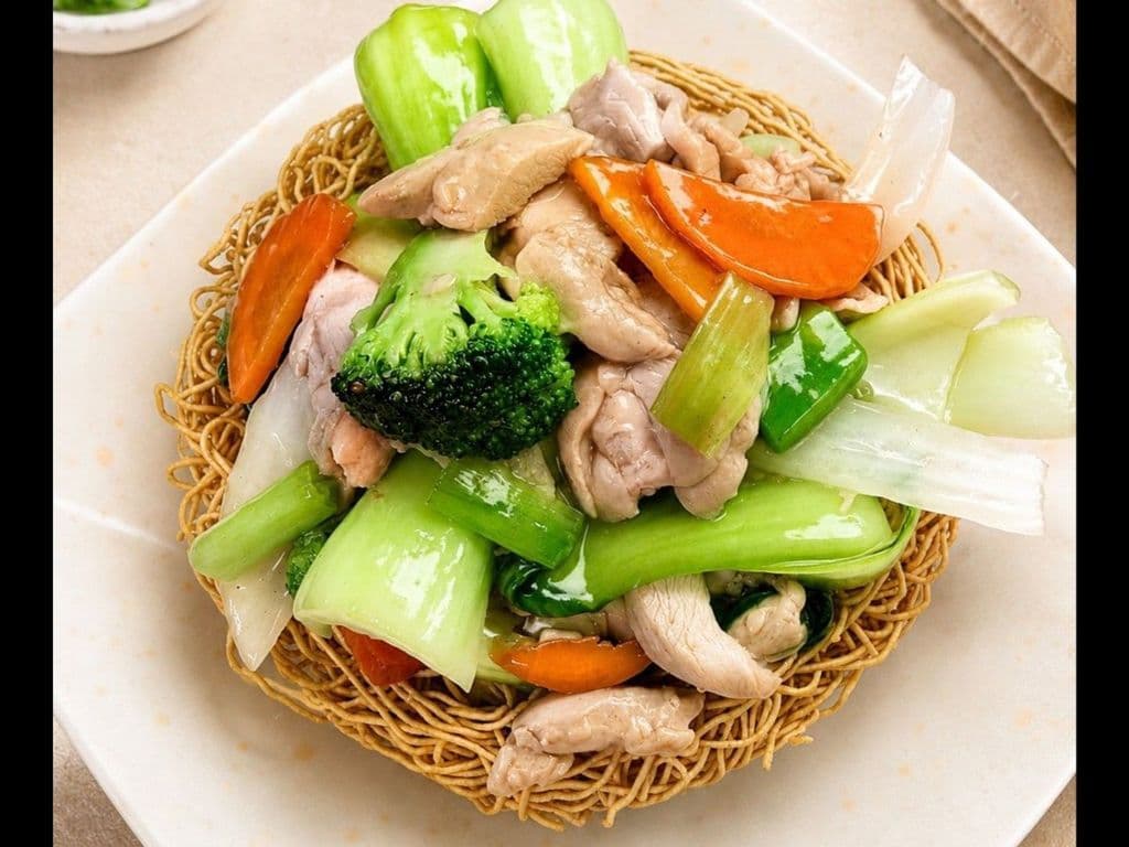 Stir Fry Chicken & Vegetables on Crispy Egg Noodles