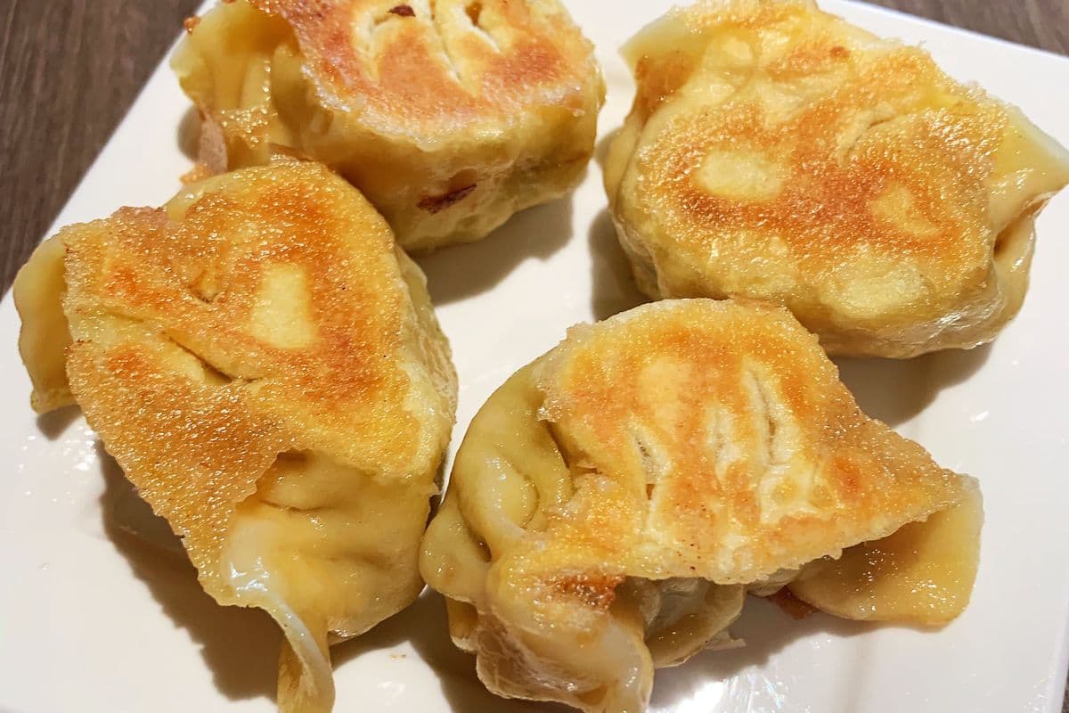 D38. Pan-Fried Chive and Meat Dumplings