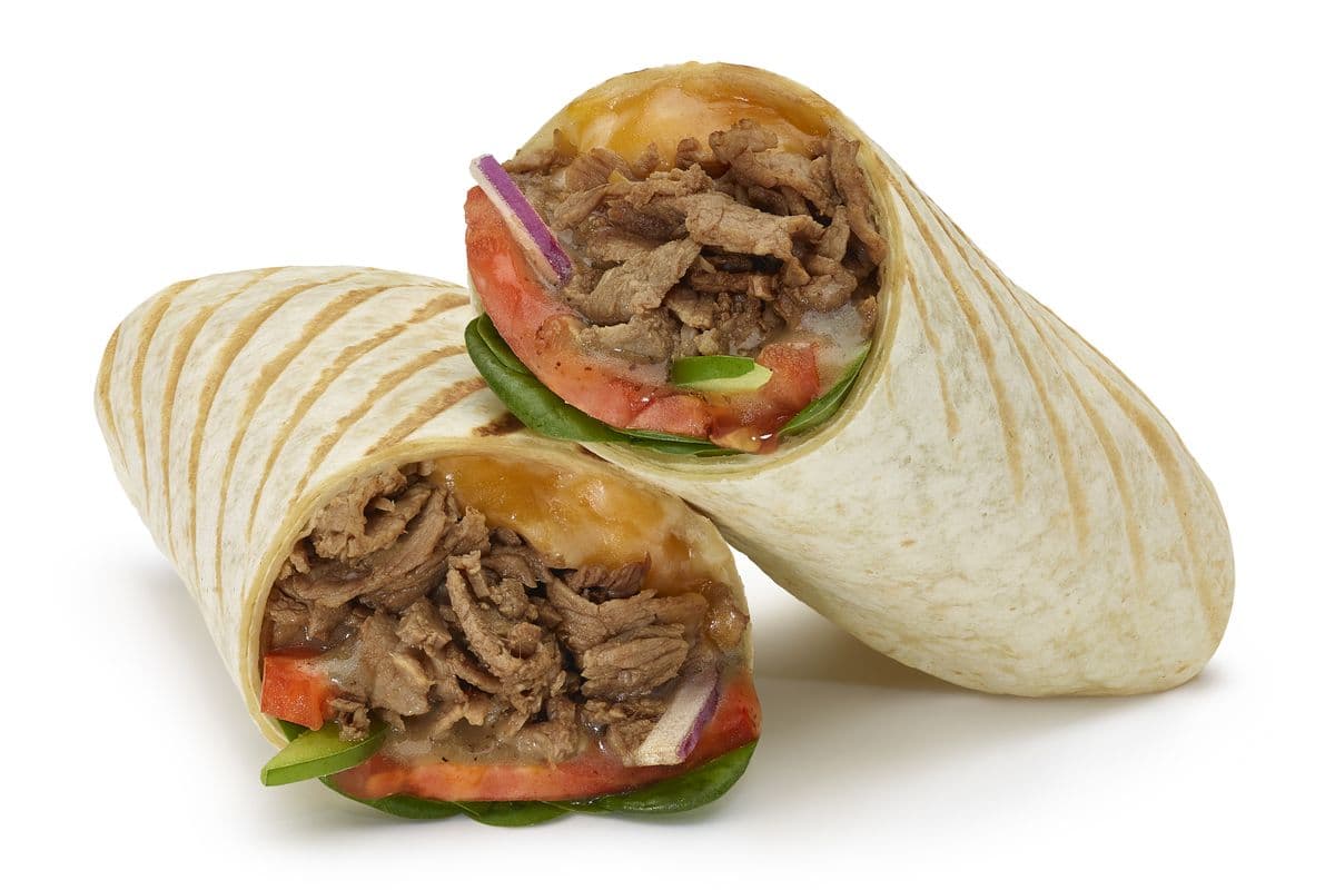Wrap grillé signature au steak, fromage, herbes et ail. / Herb and Garlic Steak and Cheese Signature Wrap (580 Cals)