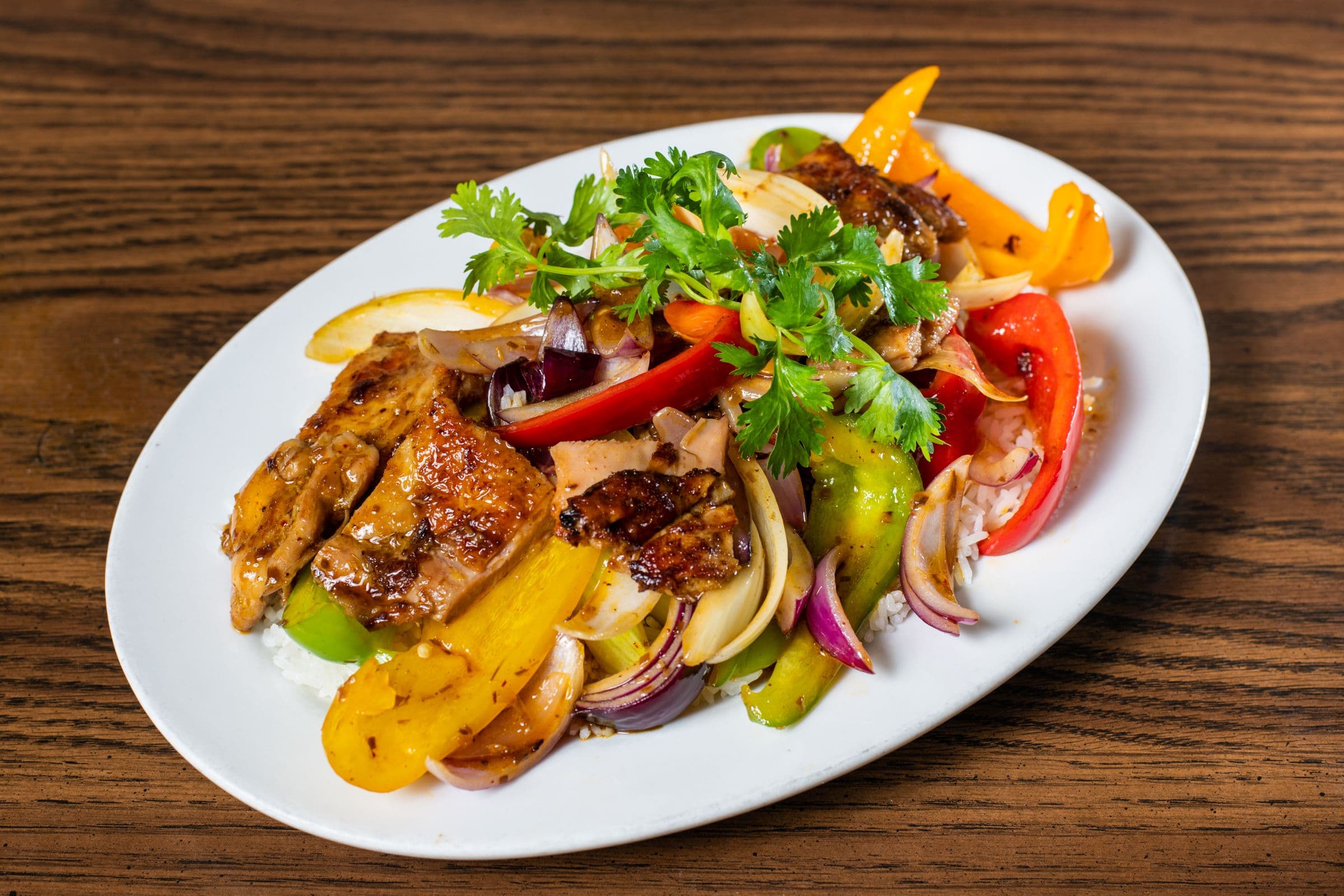 26. Lemongrass Chicken and Bell Peppers on Rice