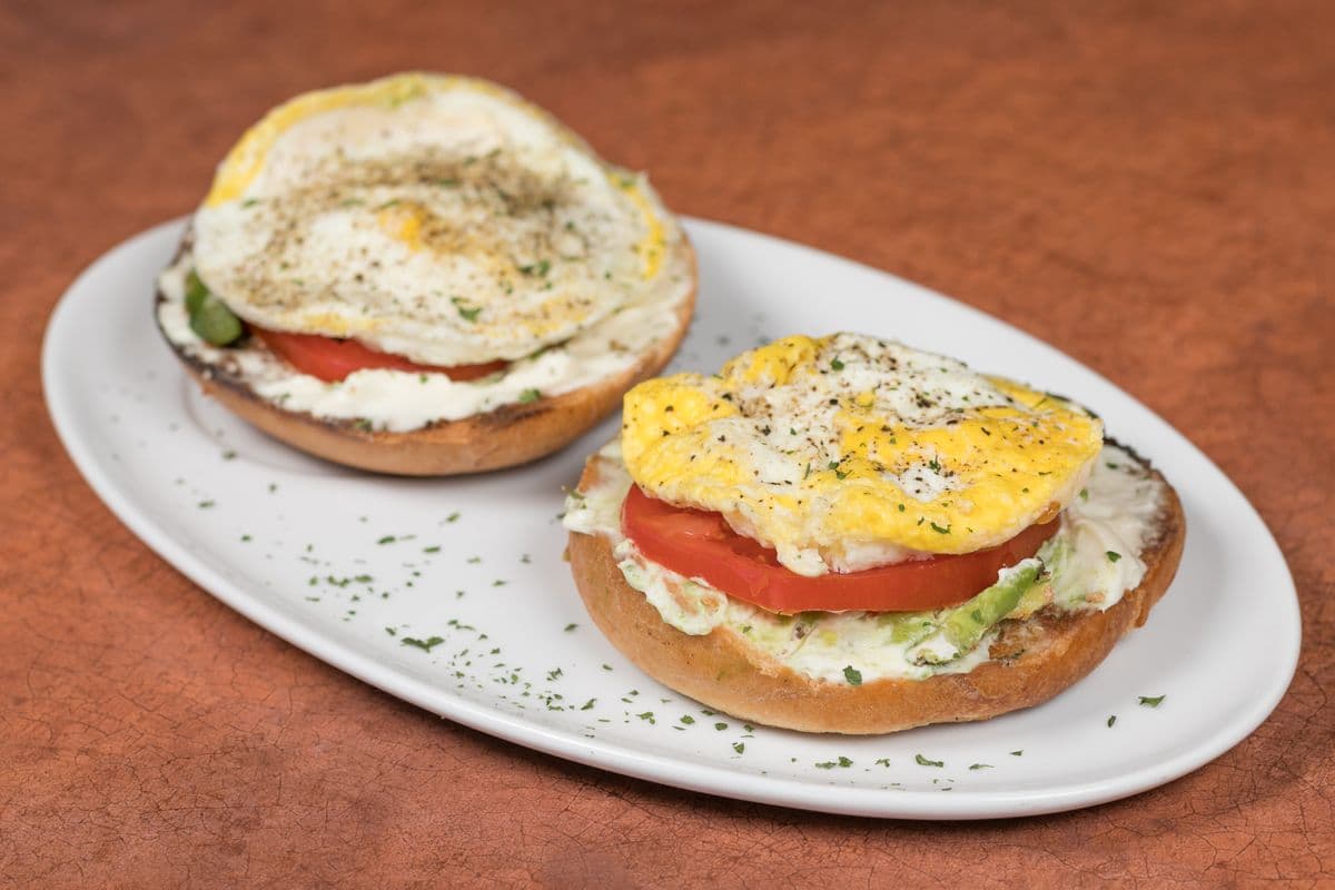 Egg, Avocado, and Tomato Breakfast Bagel Sandwich
