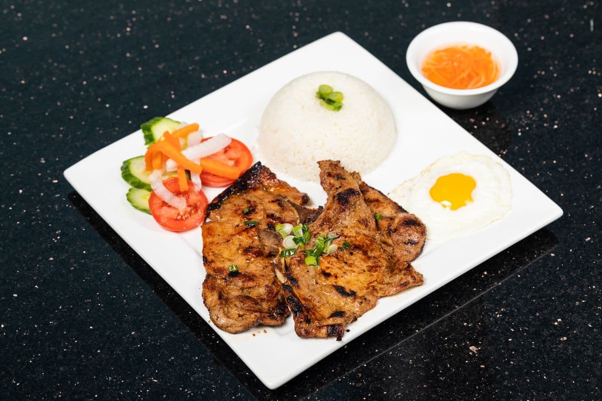 C03. Grilled Pork Chop with Egg on Rice - Com Suon Trung Opla